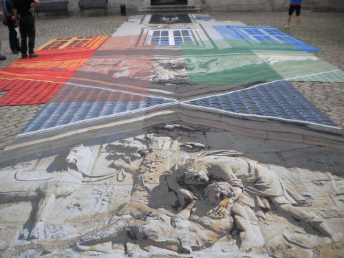 Everything seems to take on an artistic flare here, exampled by this mural sprawled across the sidewalk