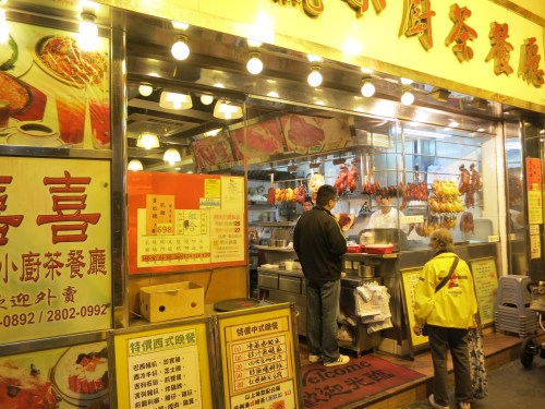 An example of a neighborhood restaurant, complete with various bits of pig hanging in the windows