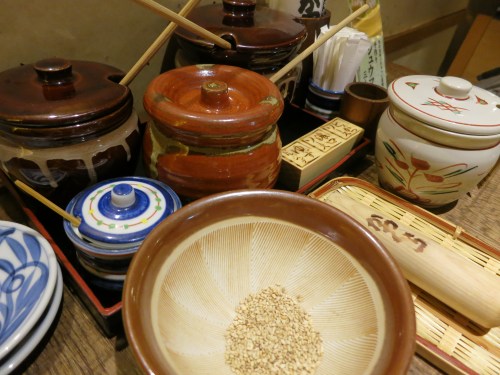 The condiment selection at a Tonkatsu restaurant in Kyoto