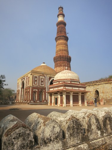 The Qutub Minar, stading high in the background