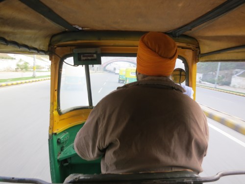 Going for a ride in one of the many orange-and green Tuk-tuks, or auto-rickshaws