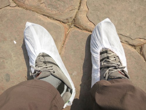 It isn't permitted to enter the Taj Mahal wearing your normal footware, so you have the option of either removing your shoves outright or opting for the very stylish footies