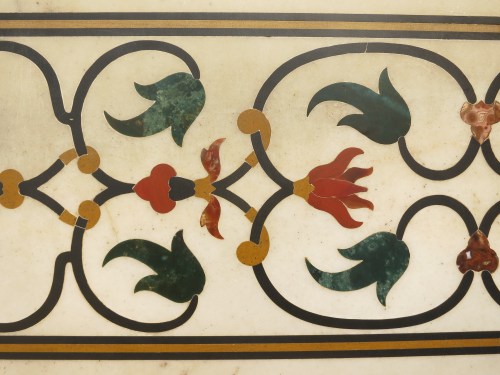 A closer inspection of the inlay work decoration the exterior of most of the structure