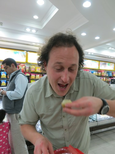 Me giving the Gol Gappas a try