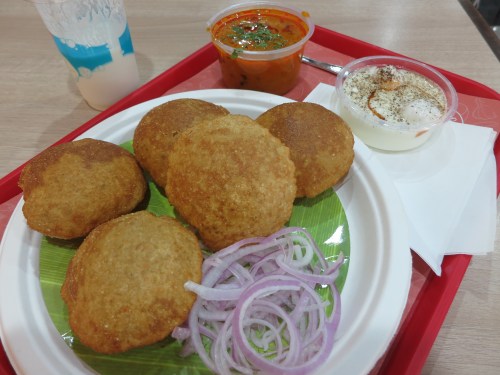Puri Sabji Pak - hollow balls of puffed dough then you then crack open and fill with a variety of fillings