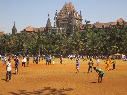 Cricket matches being held in the Oval Maiden, a massive park in the center of the city that is flanked by a variety of stunning Victorian buildings