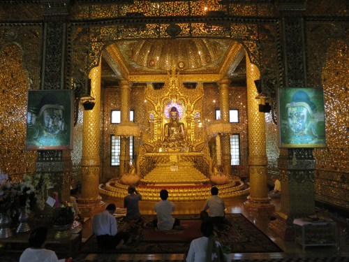 The gilded Buddha that lies in a sub-temple of the complex