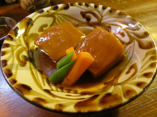 Rafute -- a dish of generously sliced Pork Belly (think bacon, just un-smoked and cut in a different manner) that has been slow-simmered in a sauce of ginger, brown sugar, sweet rice wine, and soy sauce.  Meltingly good…