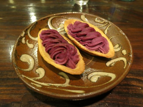 I never caught the name of these cookies (despite the fact that seemingly every store sells them), but they consist of a small, boat-like cookie that is topped with a purple sweet potato filling and lightly charred on top under a broiler