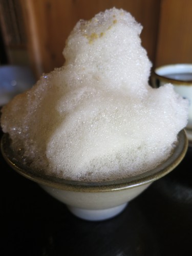 Buka Buka Cha – an indigenous tea that is topped with a mountain of foam created by whipping up rice flour and water into a frothy mess.  It can be a bit cumbersome to drink, but it does taste good!