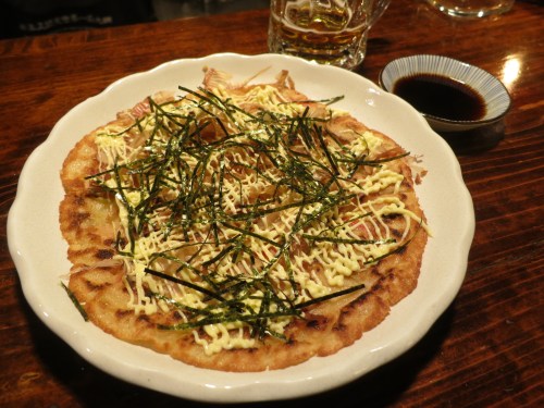 Hirayachi – a crepe-like creation (or pizza, if you will) using an eggy-pancake batter that is then topped in a similar manner to that of okonomiyaki (an Osakan favorite)