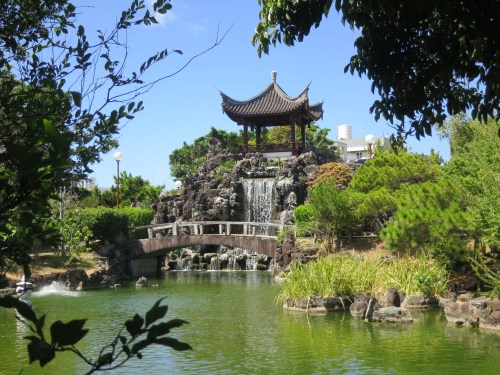 The primary pavilion and waterfall of the Chinese-style Fukushu-en Garden